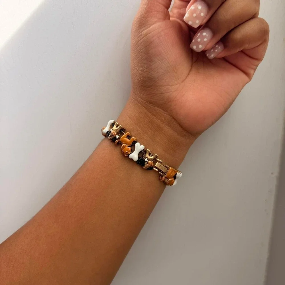 GOLD TONE JENNIE B DOG CHARM WATCH